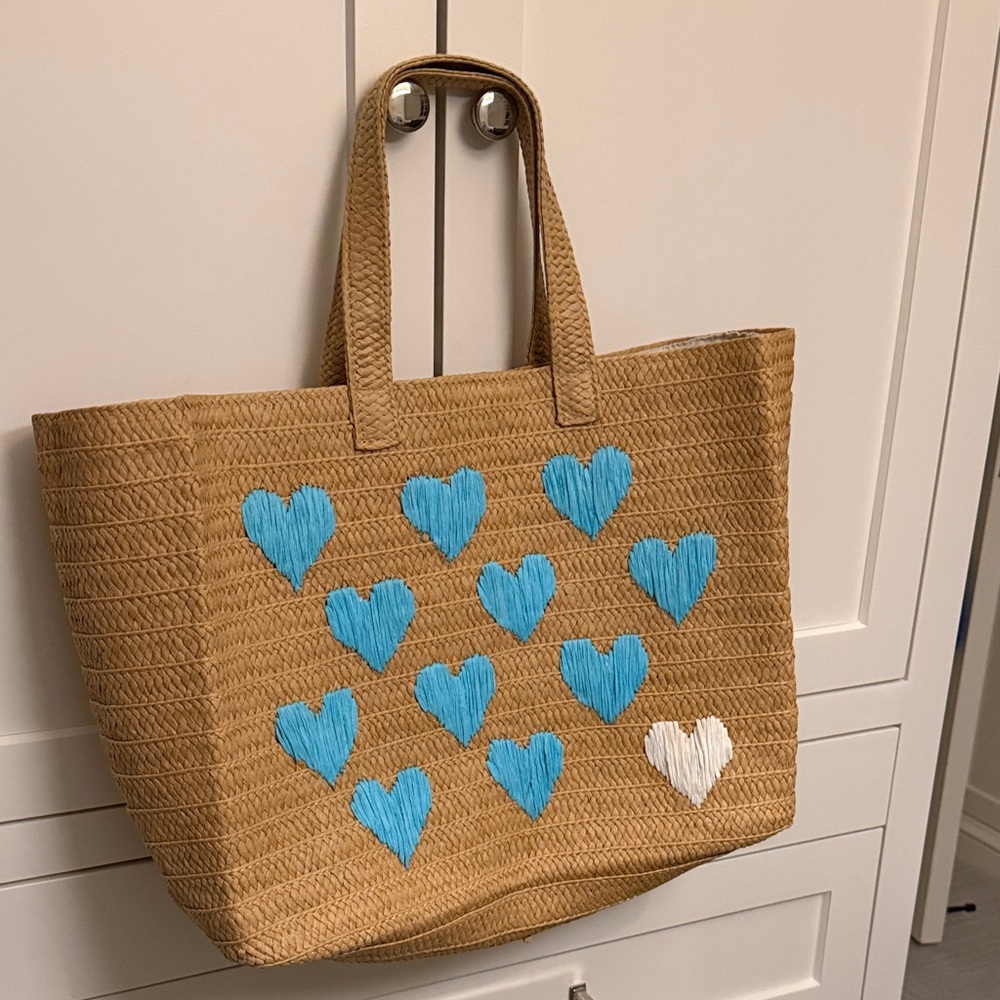 Stylish Tan Tote Bag with Blue and White Heart Accents